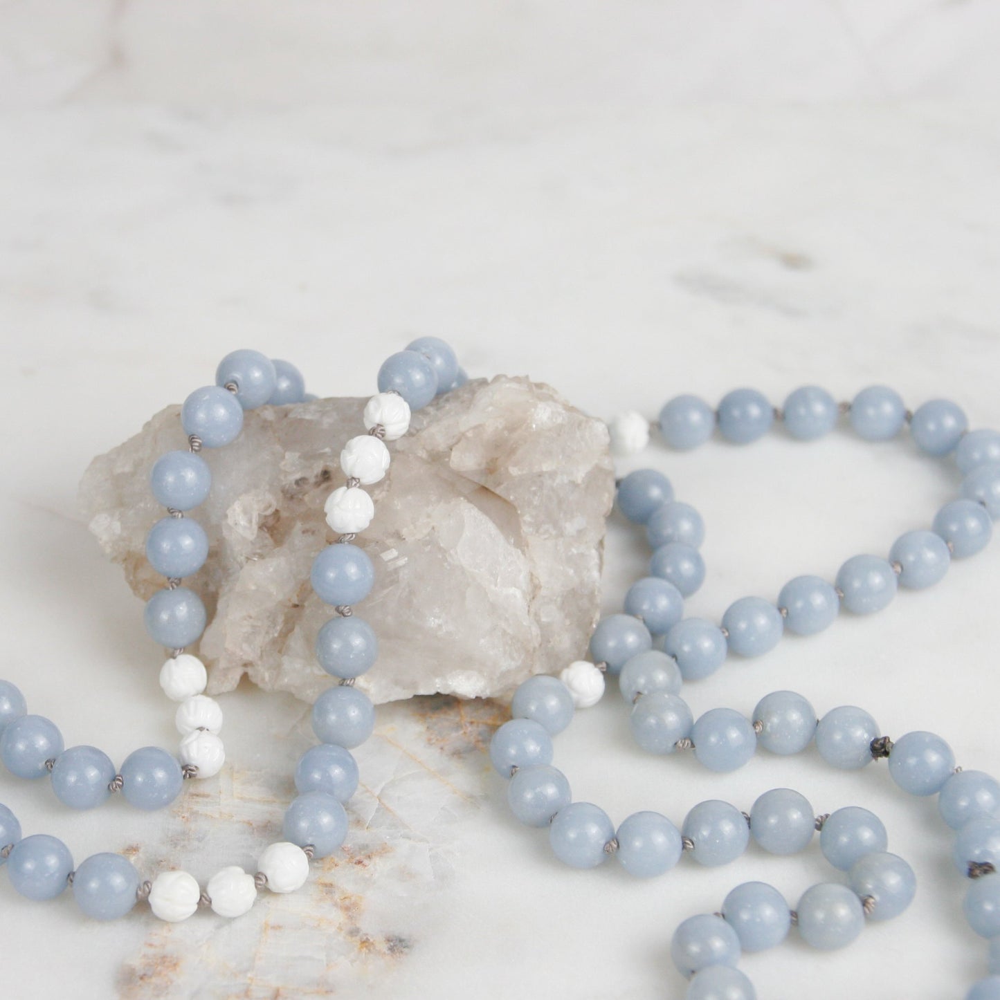 Angelite Mala Necklace with White Lotus Accents